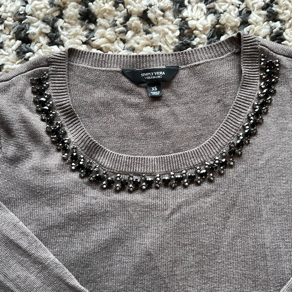 Neutral colored Vera wang sweater with jeweled neckline